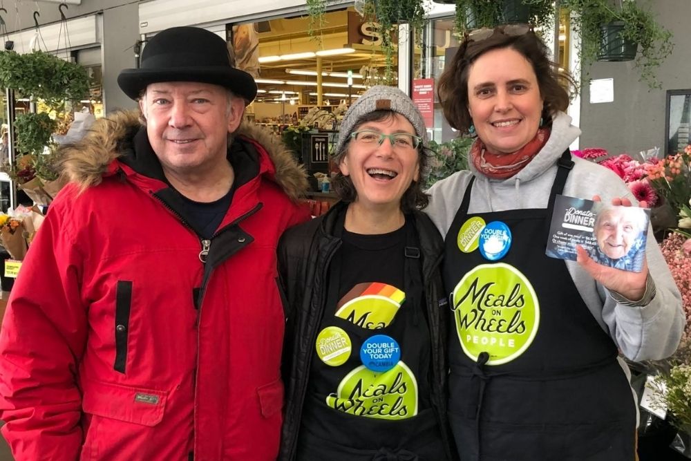 Meals on Wheels People staff and volunteers invite shoppers to join the Donate Dinner tradition at New Seasons Market, helping raise funds for nutritious meals and human connection for older adults in our community. Photo courtesy Meals on Wheels People.